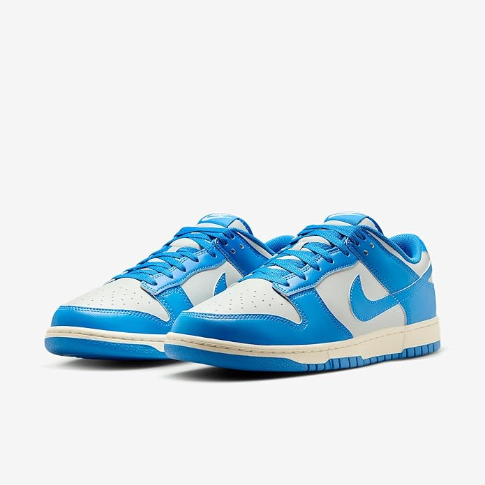 Nike Dunk low-top pair with blue uppers, white panels, and blue laces