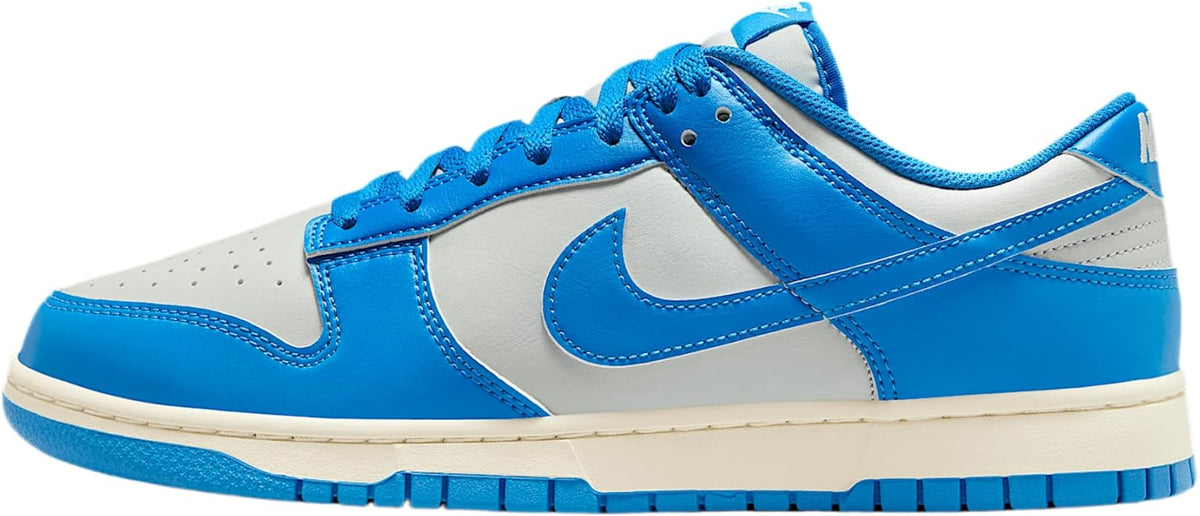 Men's low-top Nike Dunk with blue suede, white panels, and blue laces