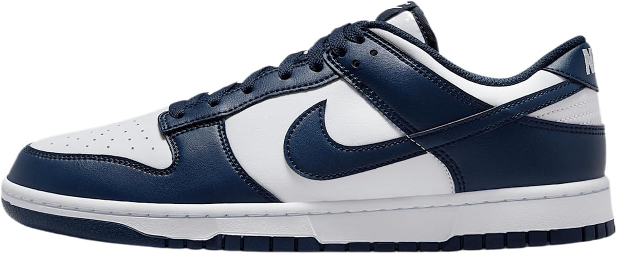 Nike Dunk Low sneakers in white and midnight navy with leather overlays and laces