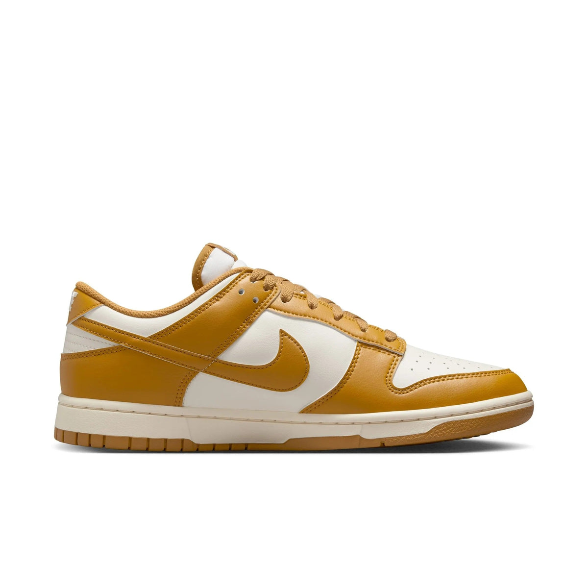 Nike Dunk Low retro sneakers side view in wheat and pale ivory with swoosh and laces