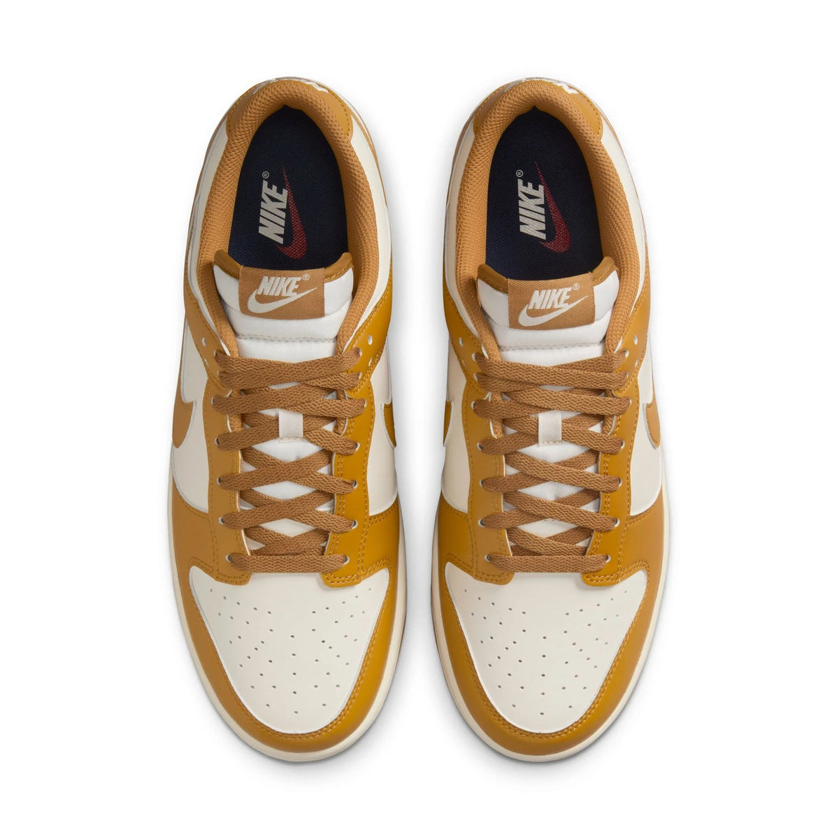 Nike Dunk Low retro sneakers top view with lace-up in pale ivory and wheat panels
