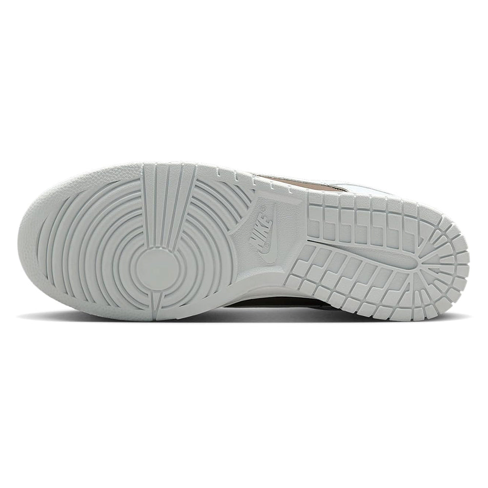 Low-top sneaker outsole with textured rubber tread and circular grip pattern
