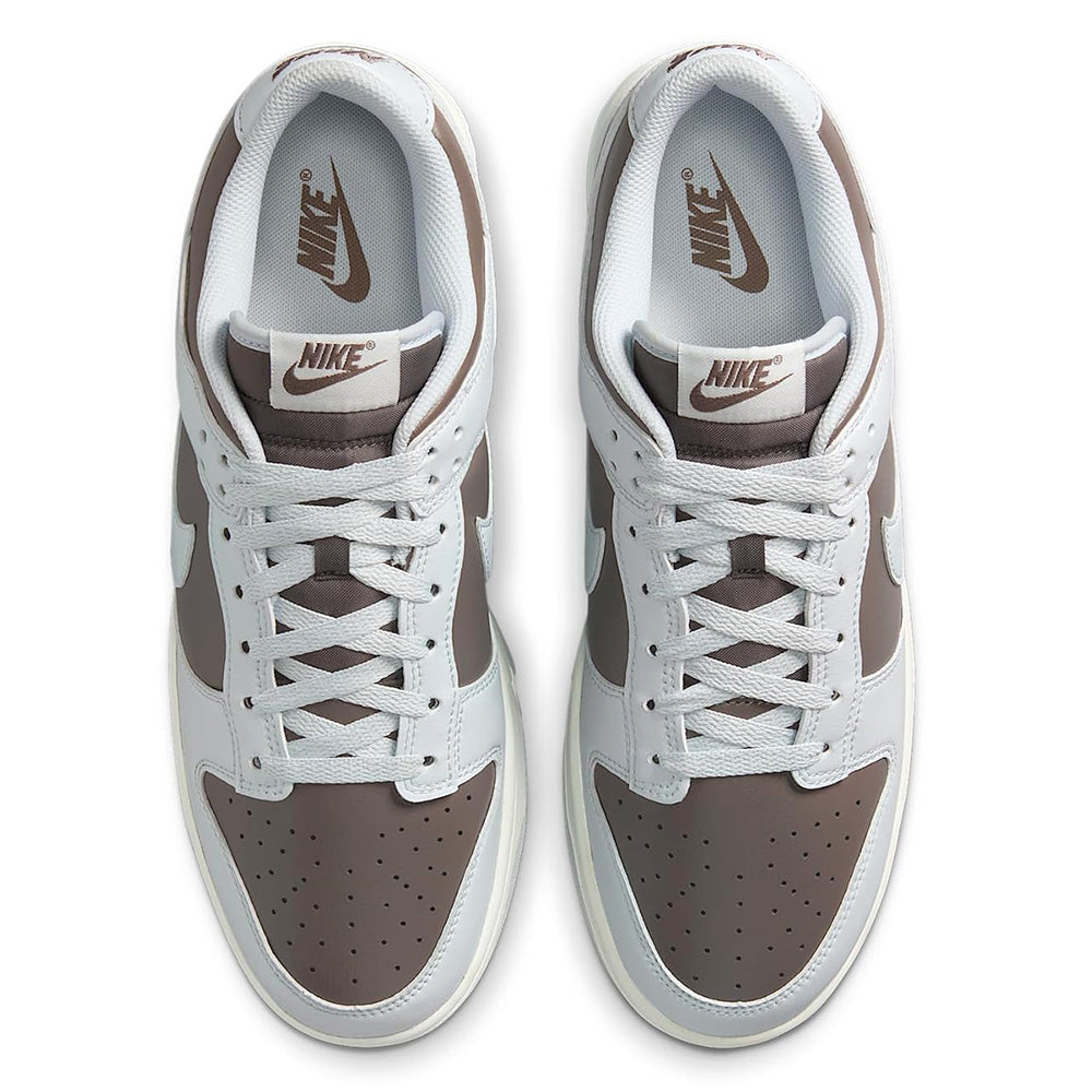 Low-top sneakers lace-up front with Nike tongue label and brown toe panel