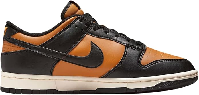 Orange and black low-top sneakers with central Nike swoosh detail and laces