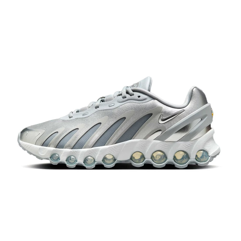 Light grey Nike Air Max DN8 sneaker with metallic accents and blue air pods