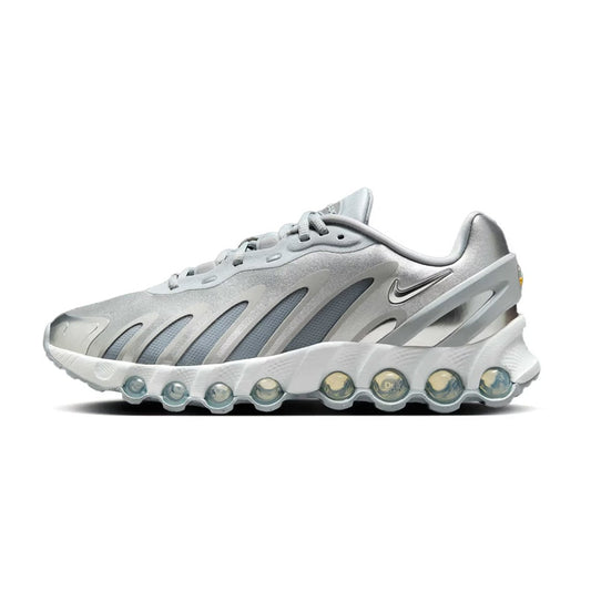 Light grey Nike Air Max DN8 sneaker with metallic accents and blue air pods