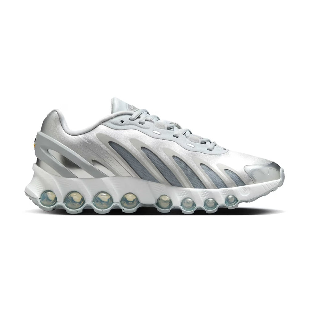 Light grey Nike Air Max DN8 running sneaker with striped design and blue air pods
