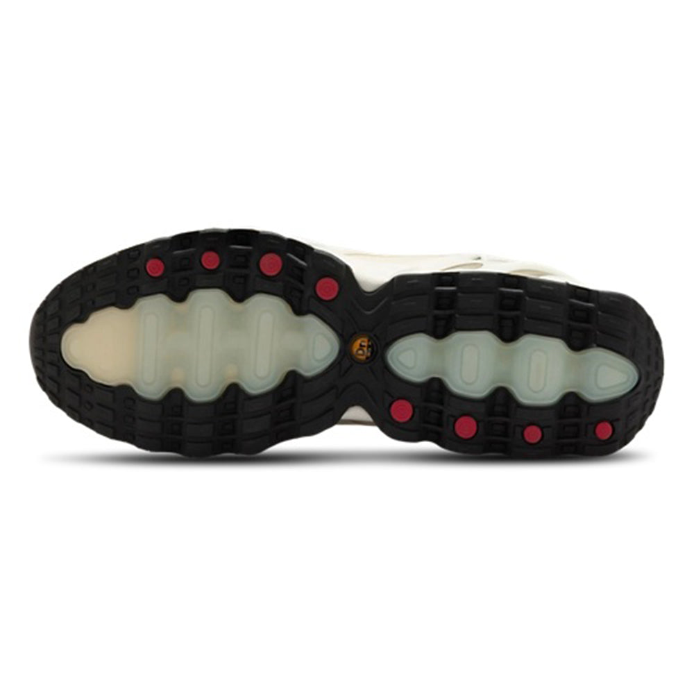 Nike Air Max DN8 sneakers outsole, black tread with red accents and Air unit windows