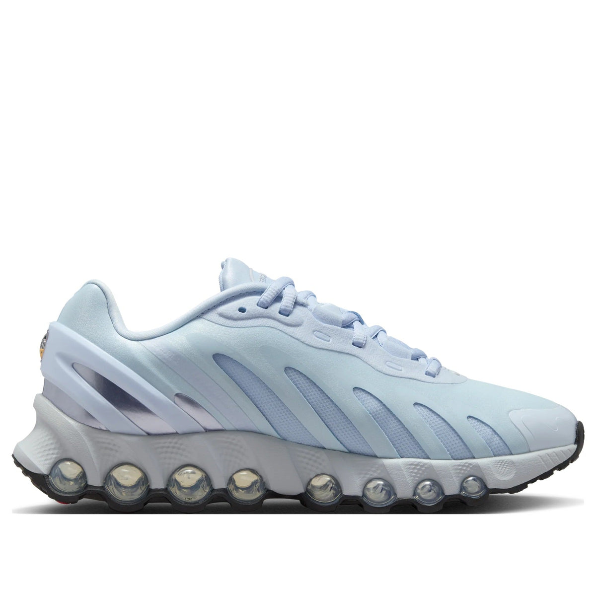 Light blue Nike Air Max DN8 sneaker side profile with swoosh and lace-up