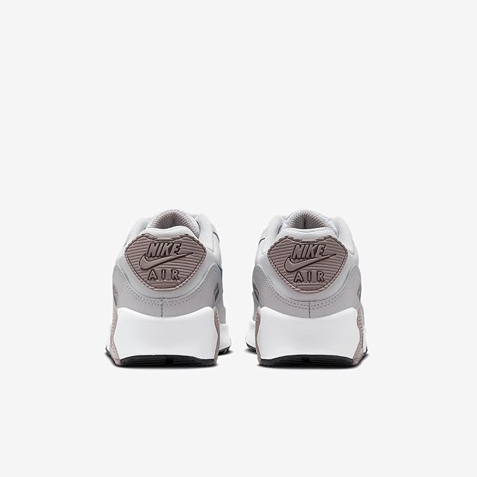 Big kid's Nike Air Max 90 sneakers, back view with NIKE Air branding on heels