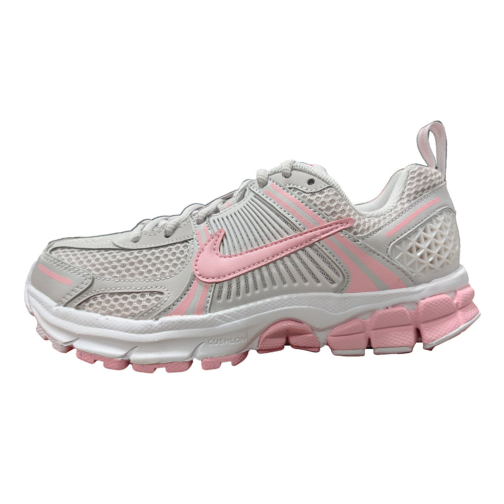 Kids Nike Vomero 5 mesh sneaker, vast grey with pink Swoosh and white outsole.