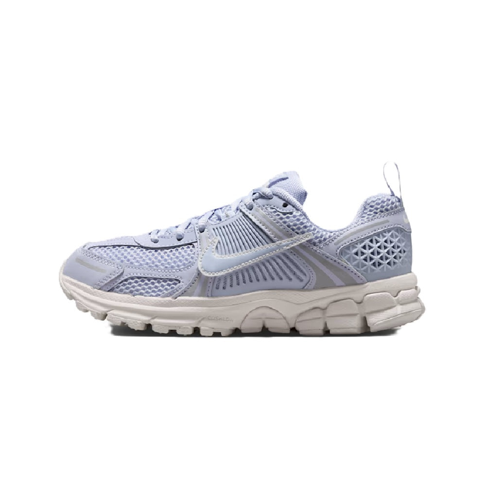Big kid's Nike running shoes, light blue and white, side view