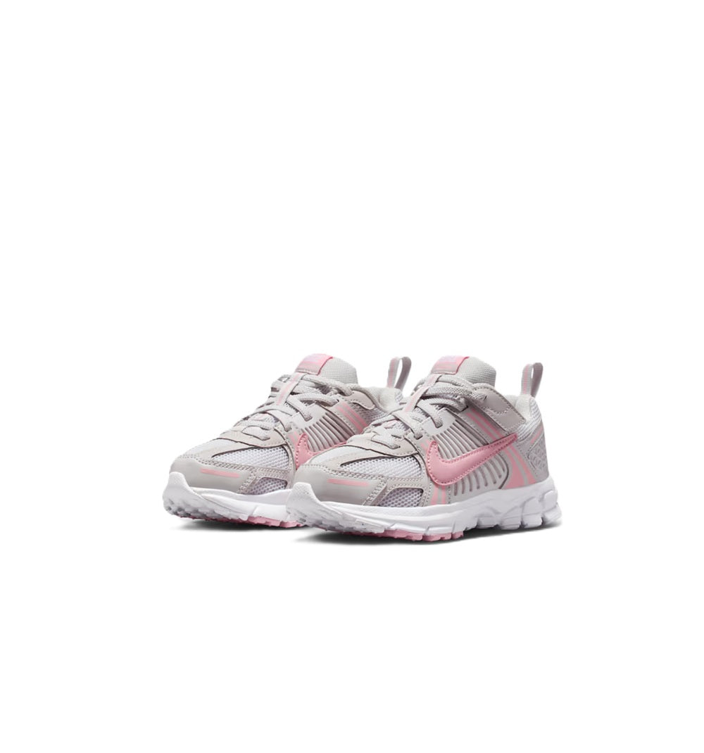 Kids' Nike running shoes, lace-up gray with pink highlights, angled view