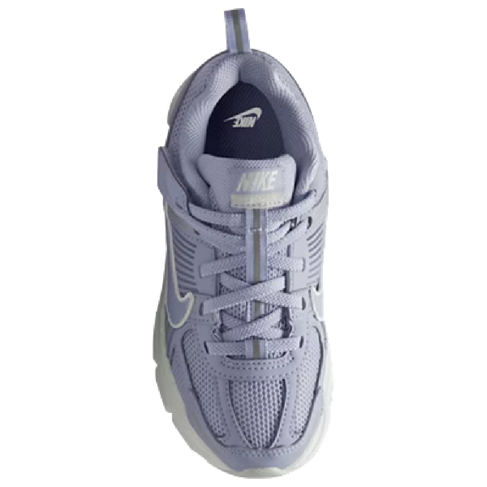 Kids Nike Vomero 5 heel view with light purple/gray lining and lace-up closure.