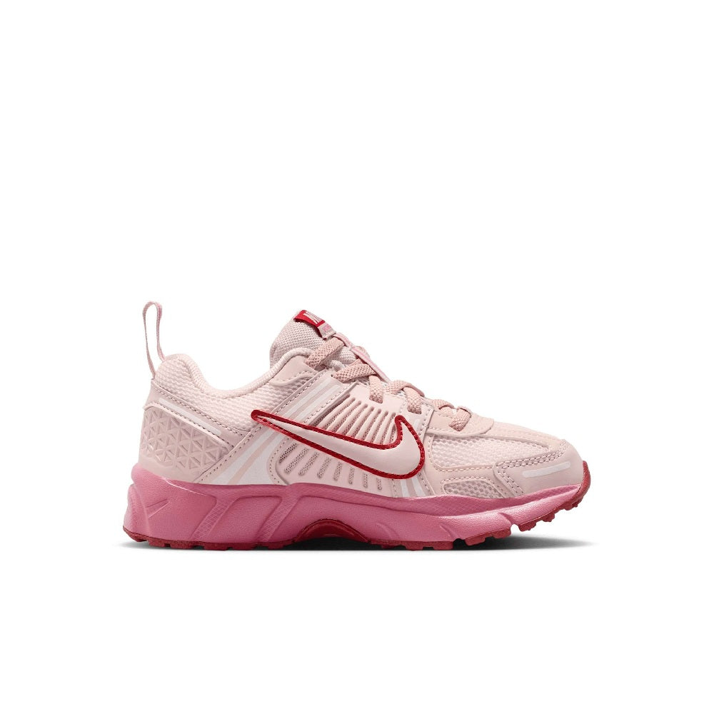 Kids' running shoes in light pink with red swoosh and pink outsole