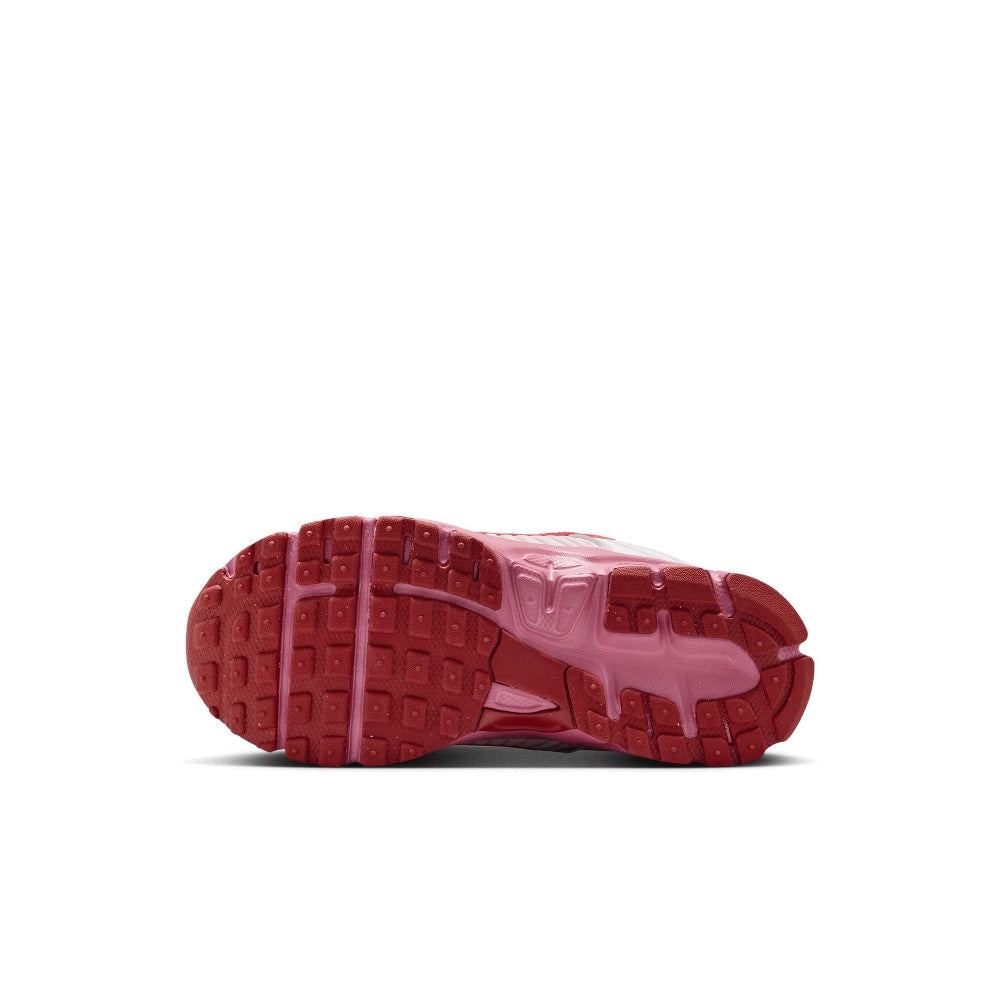 Kids' running shoes outsole view, burgundy tread with pink cushioning