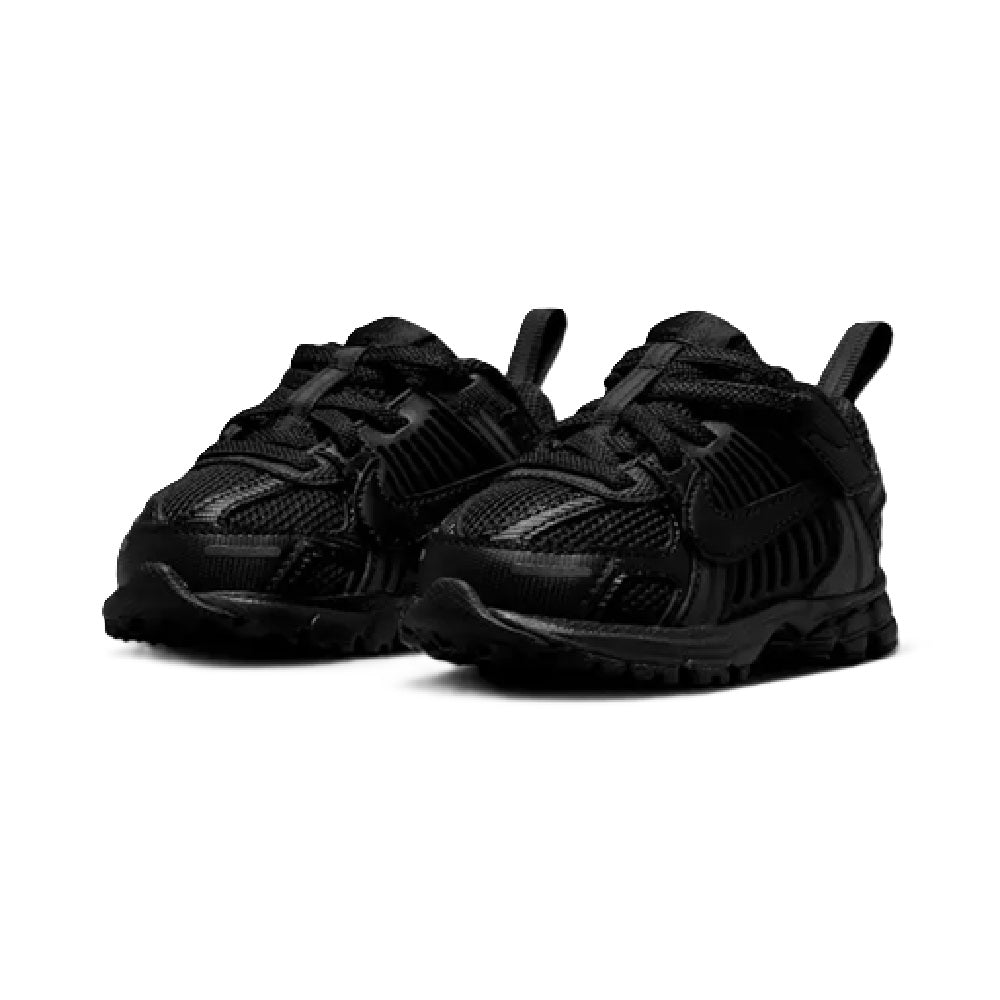 Toddler Nike black sneakers, front angle with textured mesh and lace-up closure