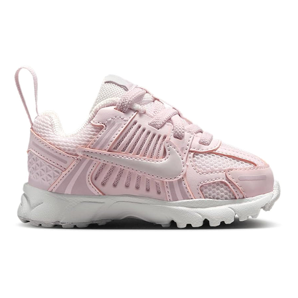 Toddler pink Nike sneakers with swoosh, knit collar, and grippy outsole