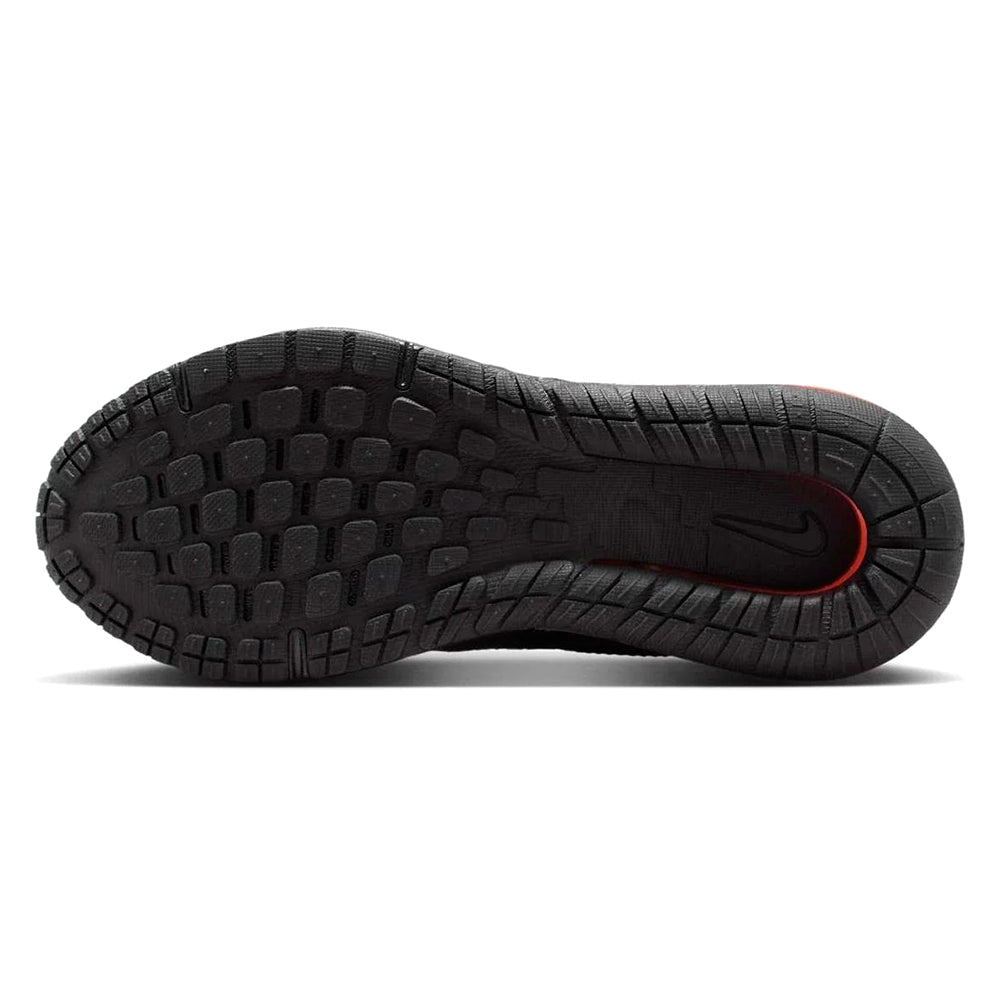 Big kid's Nike Air Max Phoenix sneakers outsole, black rubber tread with red swoosh