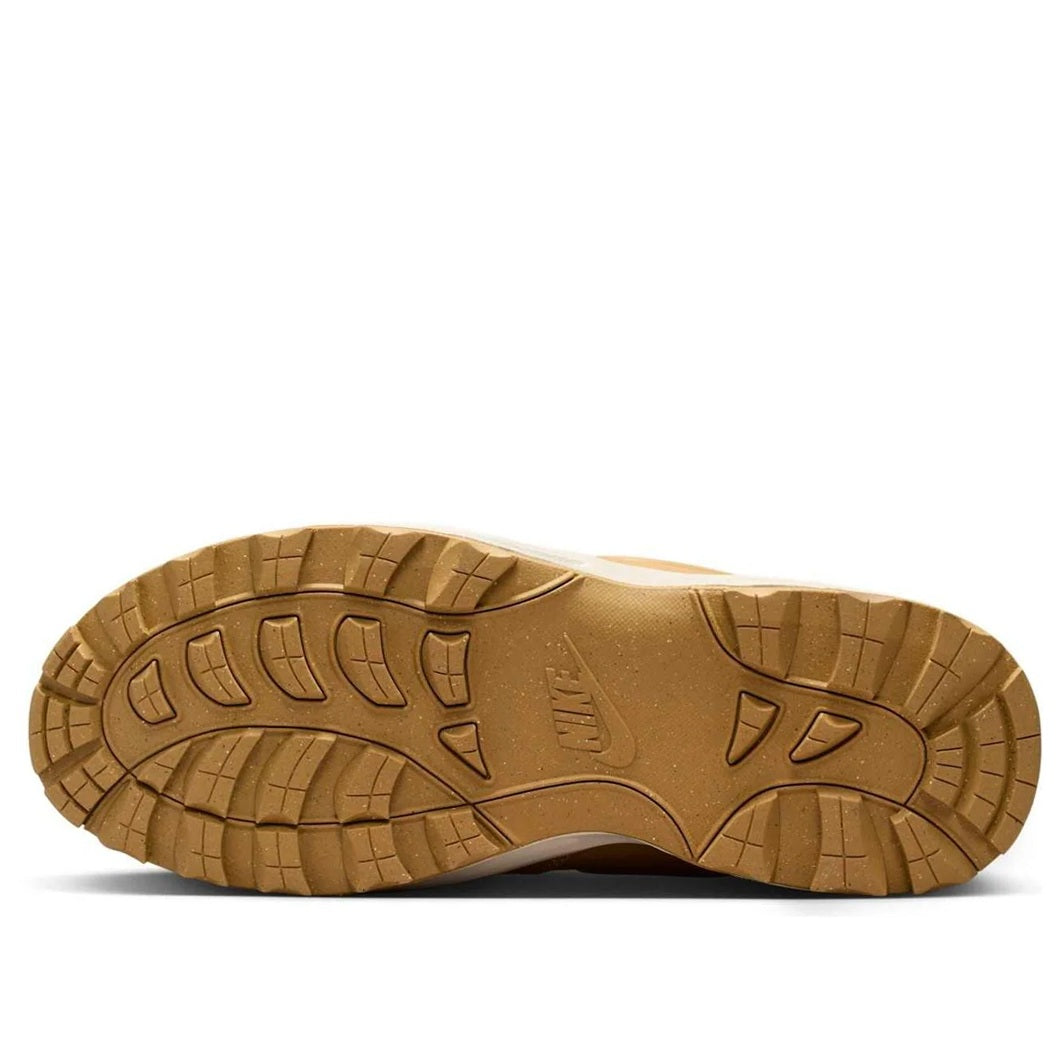Men's Nike high-top boot outsole with rugged tread and tan rubber sole