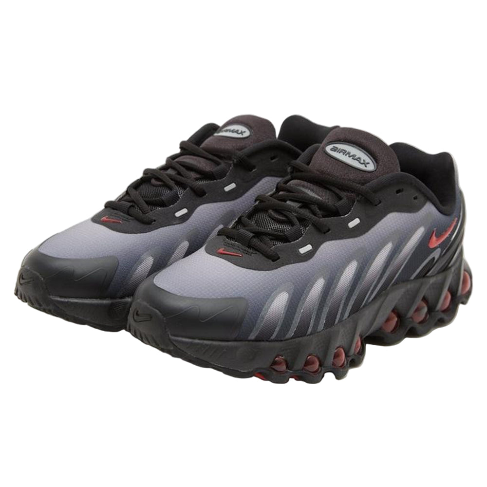 Big kid's Nike Air Max DN8 sneakers, side view with black laces and red heel details