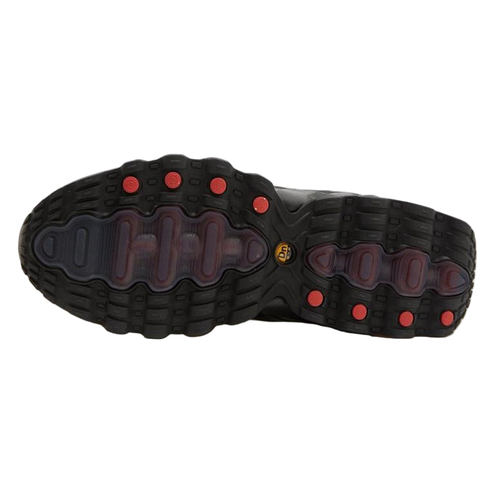 Big kid's Nike Air Max DN8 sneakers, outsole tread with dark rubber and red traction dots