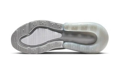 Light gray sneaker outsole with tread and visible Air Max heel cushioning unit