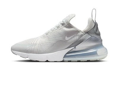 Light gray knit Nike sneaker with Swoosh and visible Air Max cushioning, lace-up