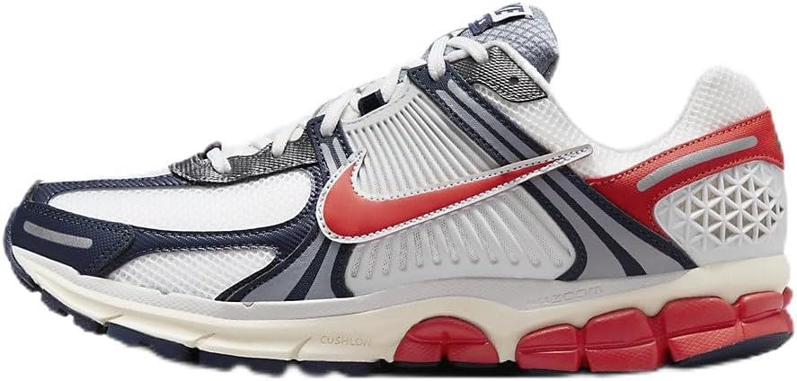 Men's Nike running shoe with white-gray knit upper, navy panels, red Swoosh, lace-up