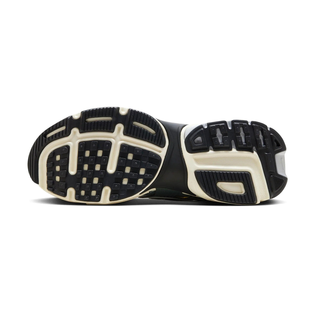 Nike V2K Run rubber outsole with black tread and cream midfoot wrap