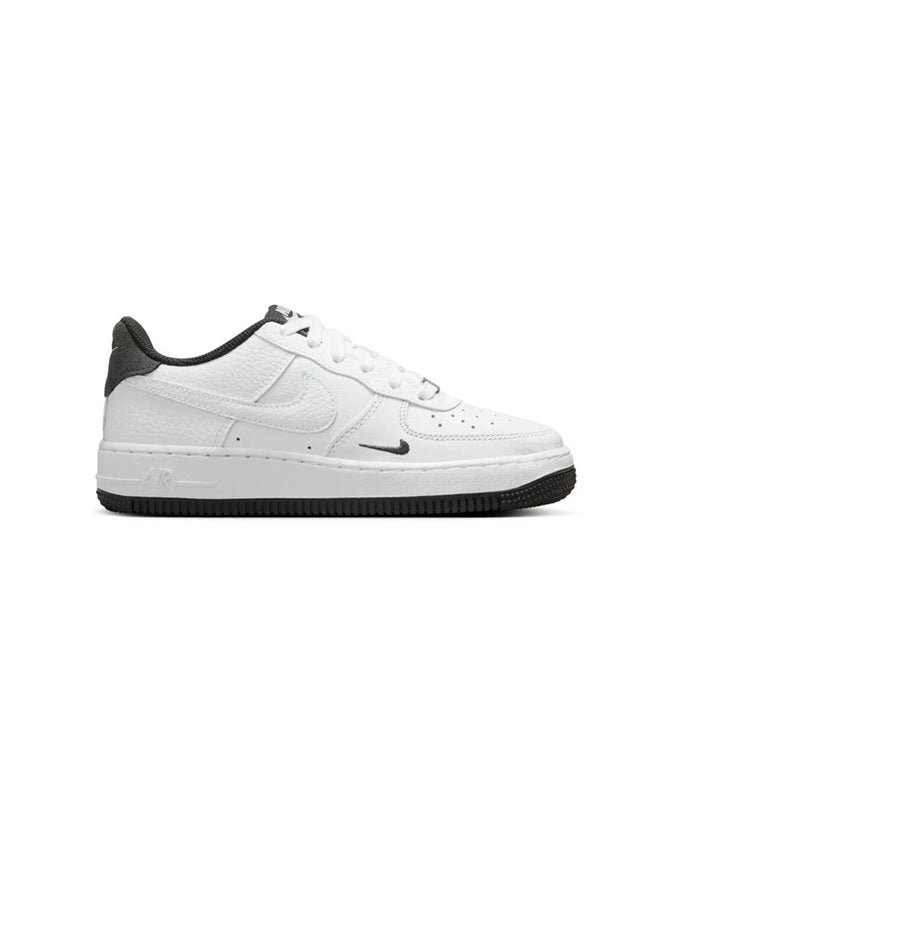 White leather lace-up sneakers with swoosh logo, black sole, and dark collar