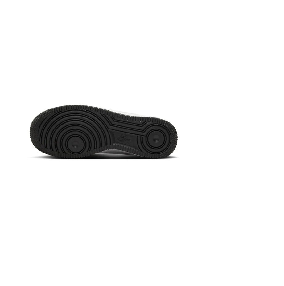 Black rubber outsole for white low-top sneakers with circular traction pods