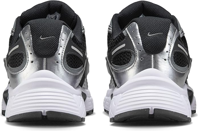 Nike men's running shoes heel view with black collar, silver back panels, white sole