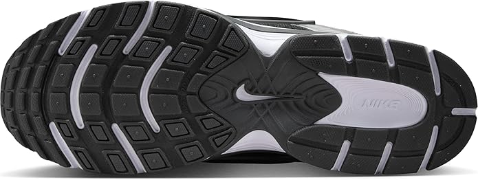 Nike men's running shoes outsole with black rubber tread and gray traction inserts