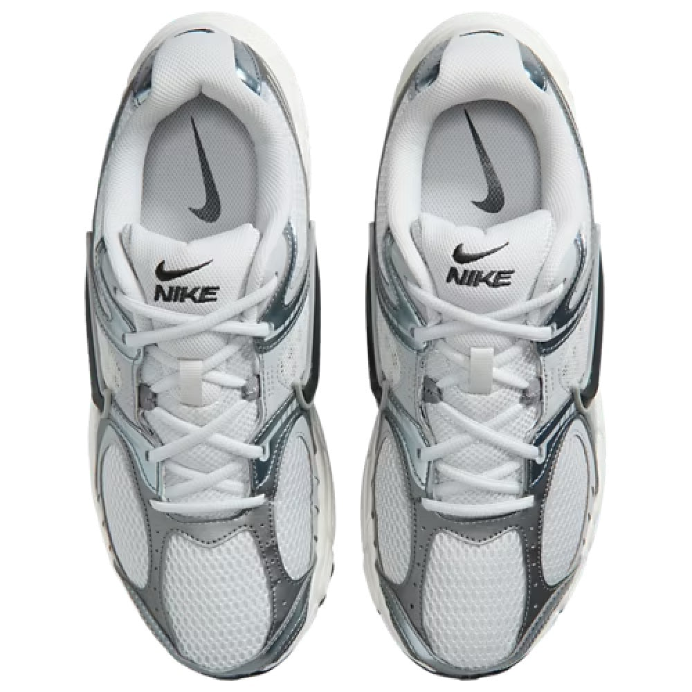 Men's Nike running shoe tongue and laces, light grey upper with Nike logo