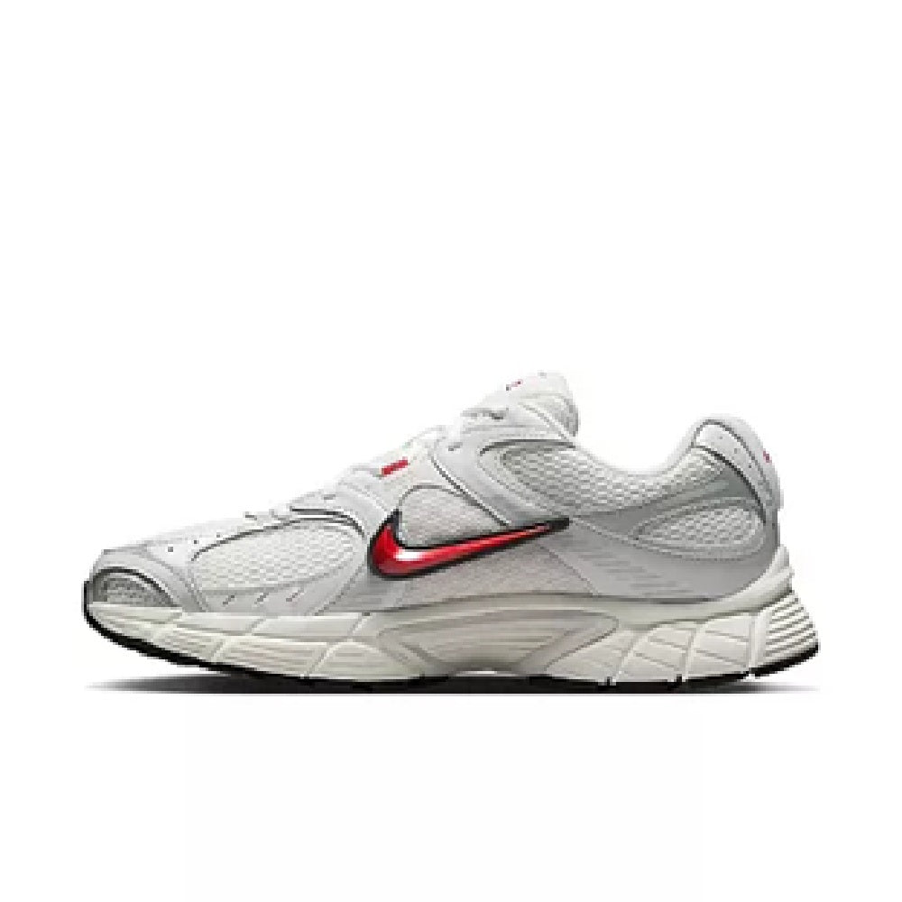 Men's Nike running shoes, white upper with red swoosh and black outsole, angled view