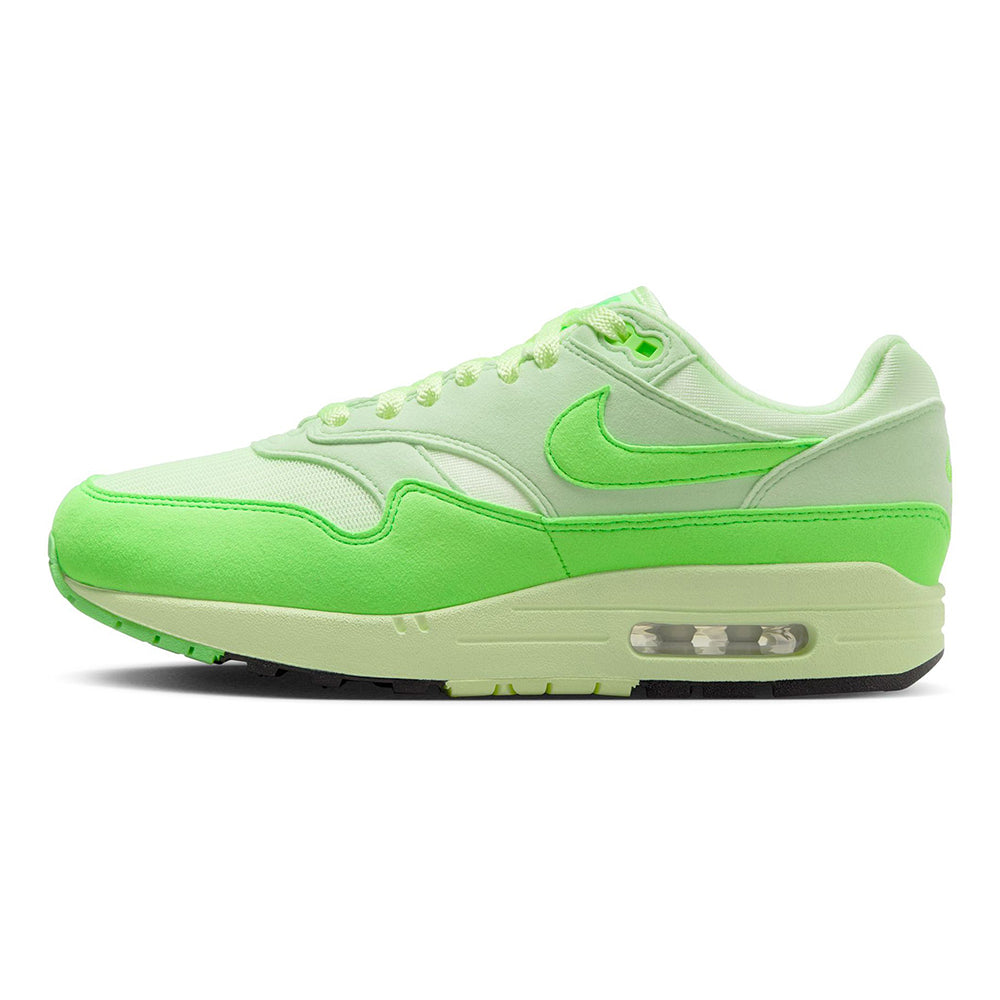 Lime green Nike Air Max 1 '87 sneakers with Swoosh and visible Air unit midsole