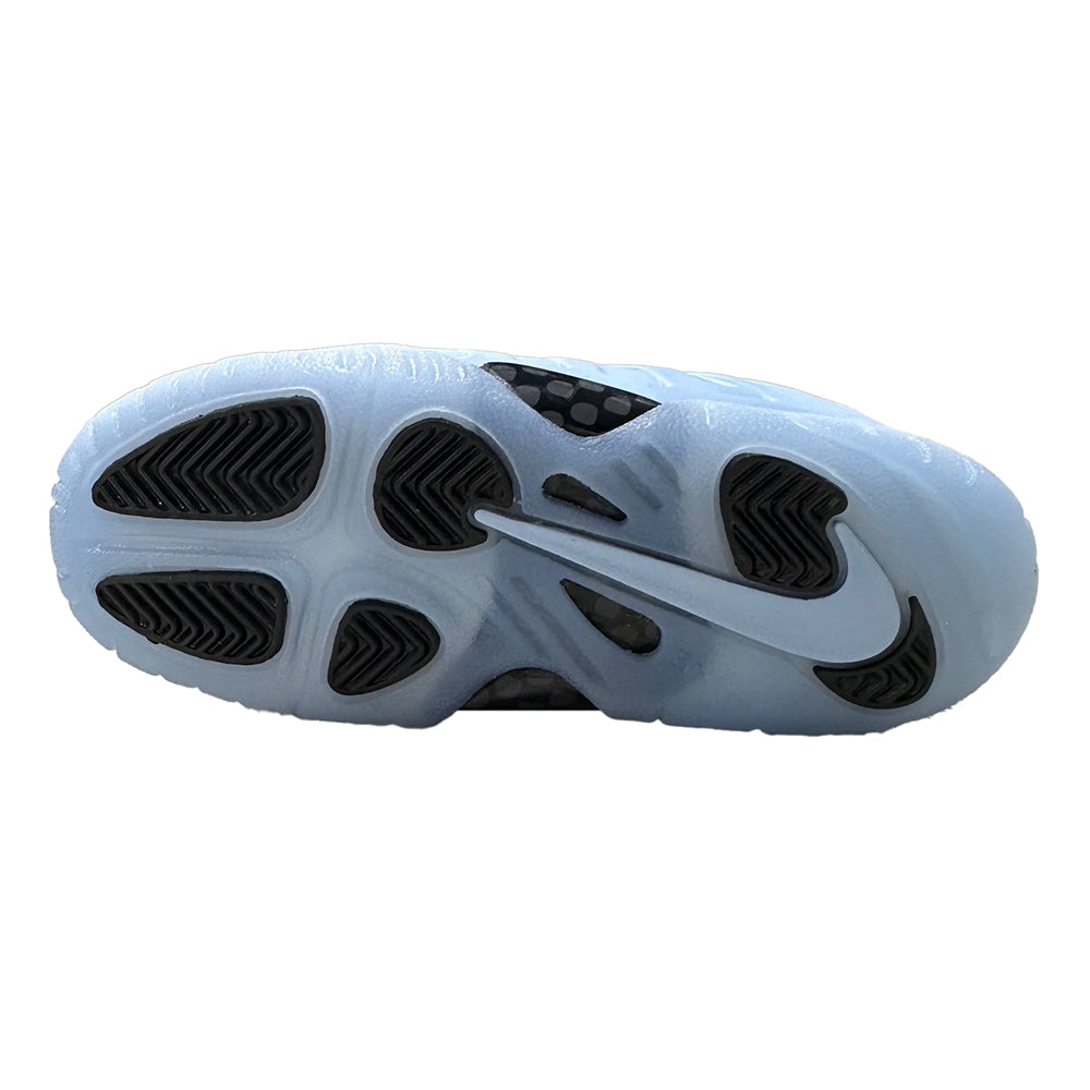 Toddler sneakers outsole view with light blue rubber and dark traction tread