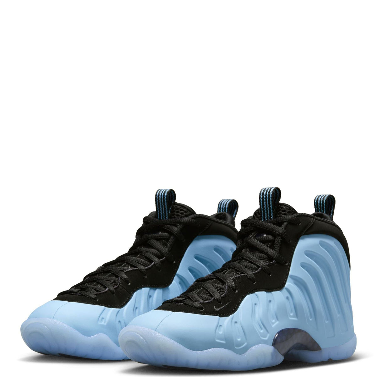 Pair of kids high-top basketball shoes with black uppers and light blue textured midsole