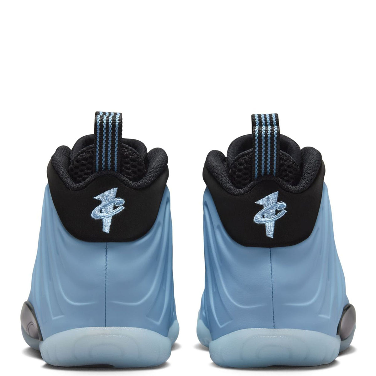 Kids high-top shoe heel view with black back, light blue panels, and blue logo on collar