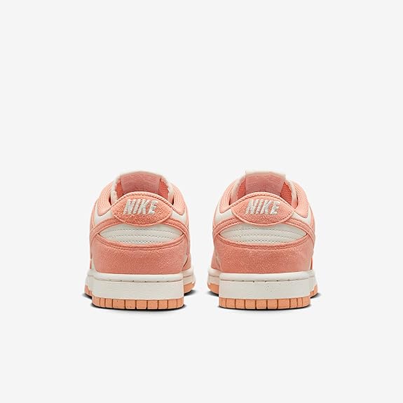 Women's Nike Dunk Low sneakers, peach heel with Nike logo and white midsole