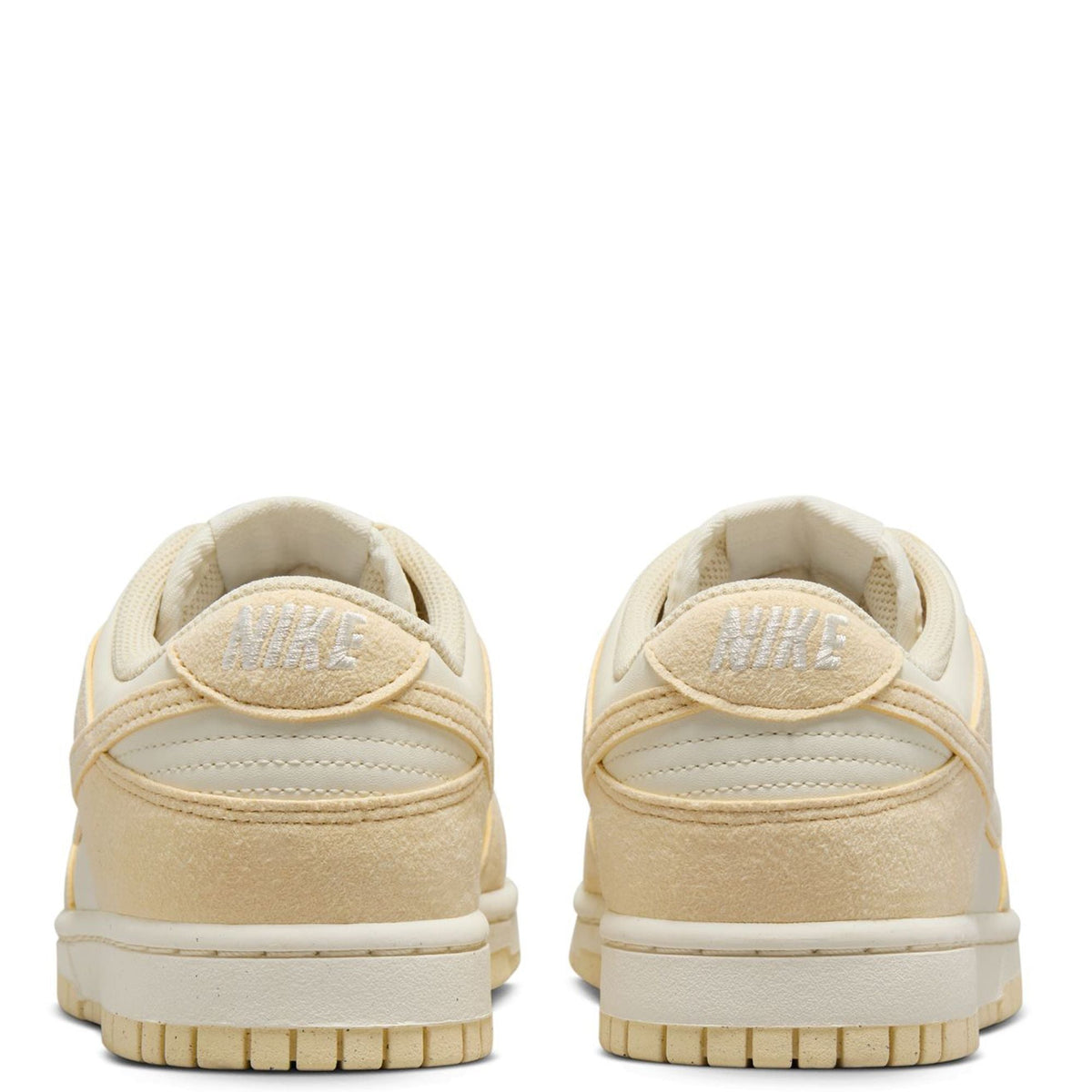 Nike Dunk Low sneakers with heel tab and cushioned collar, pale ivory/beige