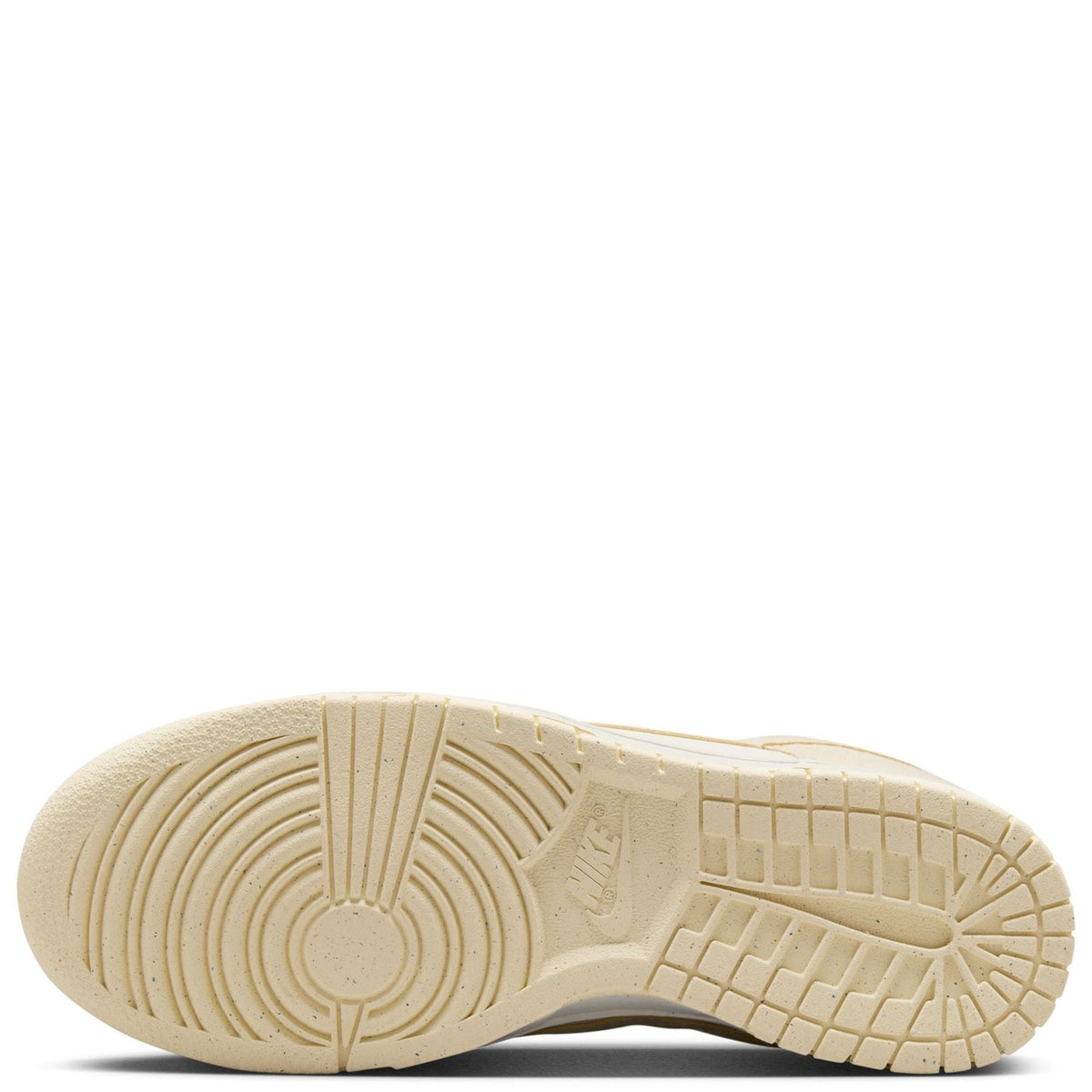 Nike Dunk Low rubber outsole view, pale ivory with textured traction