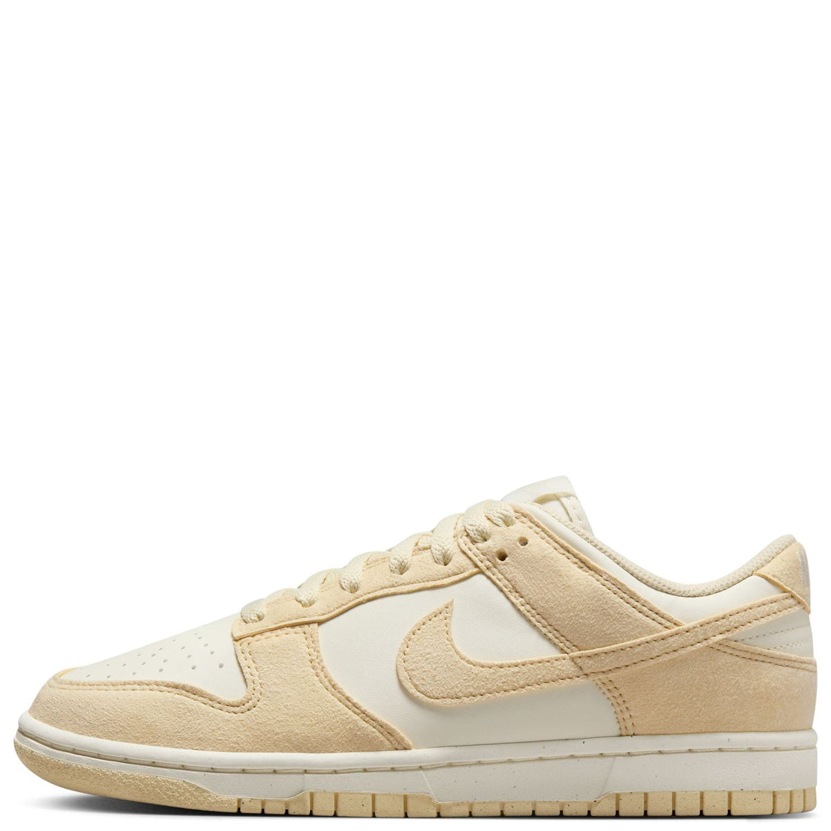 Low-top Nike Dunk sneakers in pale ivory, beige panels, white swoosh, lace-up
