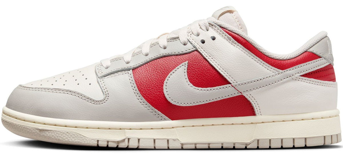 Men's Nike Dunk Low sneakers in white leather with red overlays, lace-up