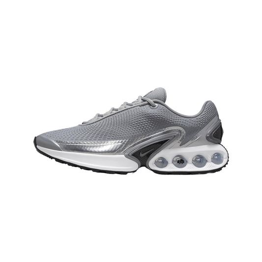 Metallic silver Nike Air running sneaker with mesh upper and visible air unit sole