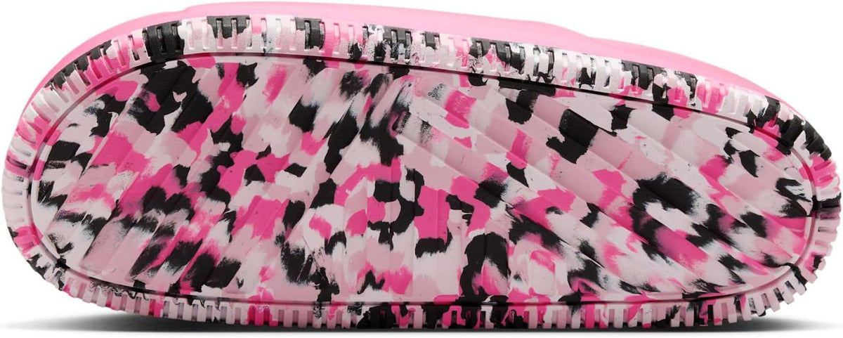 Women's pink slide sandals with camo-style patterned outsole tread view
