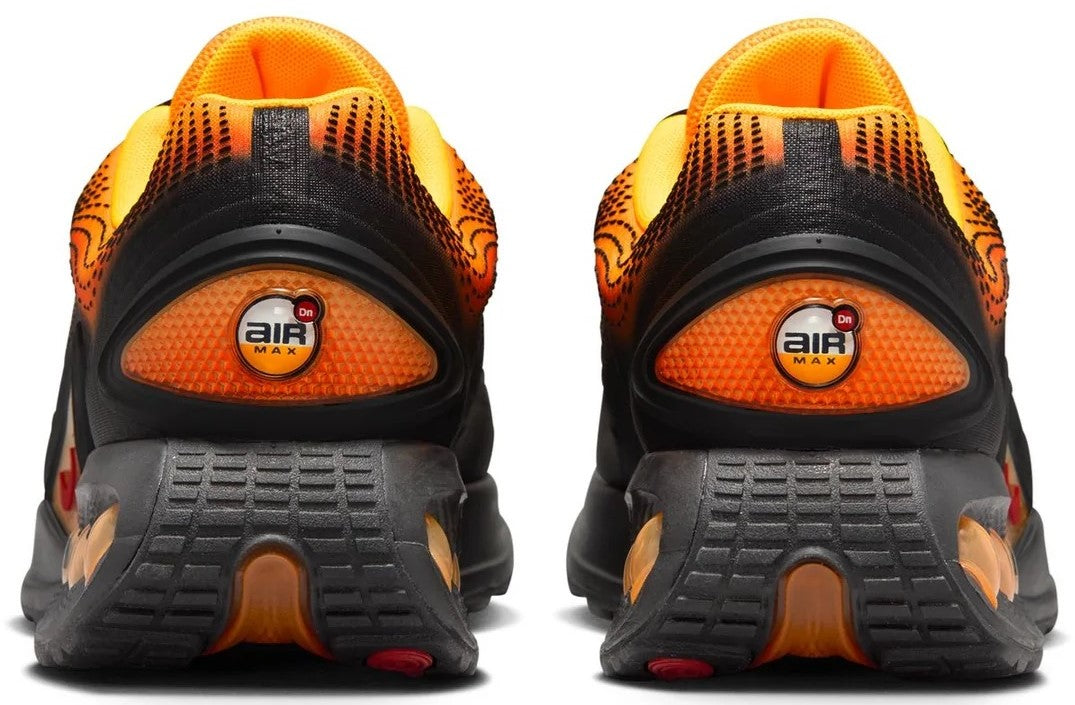 Men's Nike Air Max DN sneakers, orange-and-black heel with Air logo and padded collar