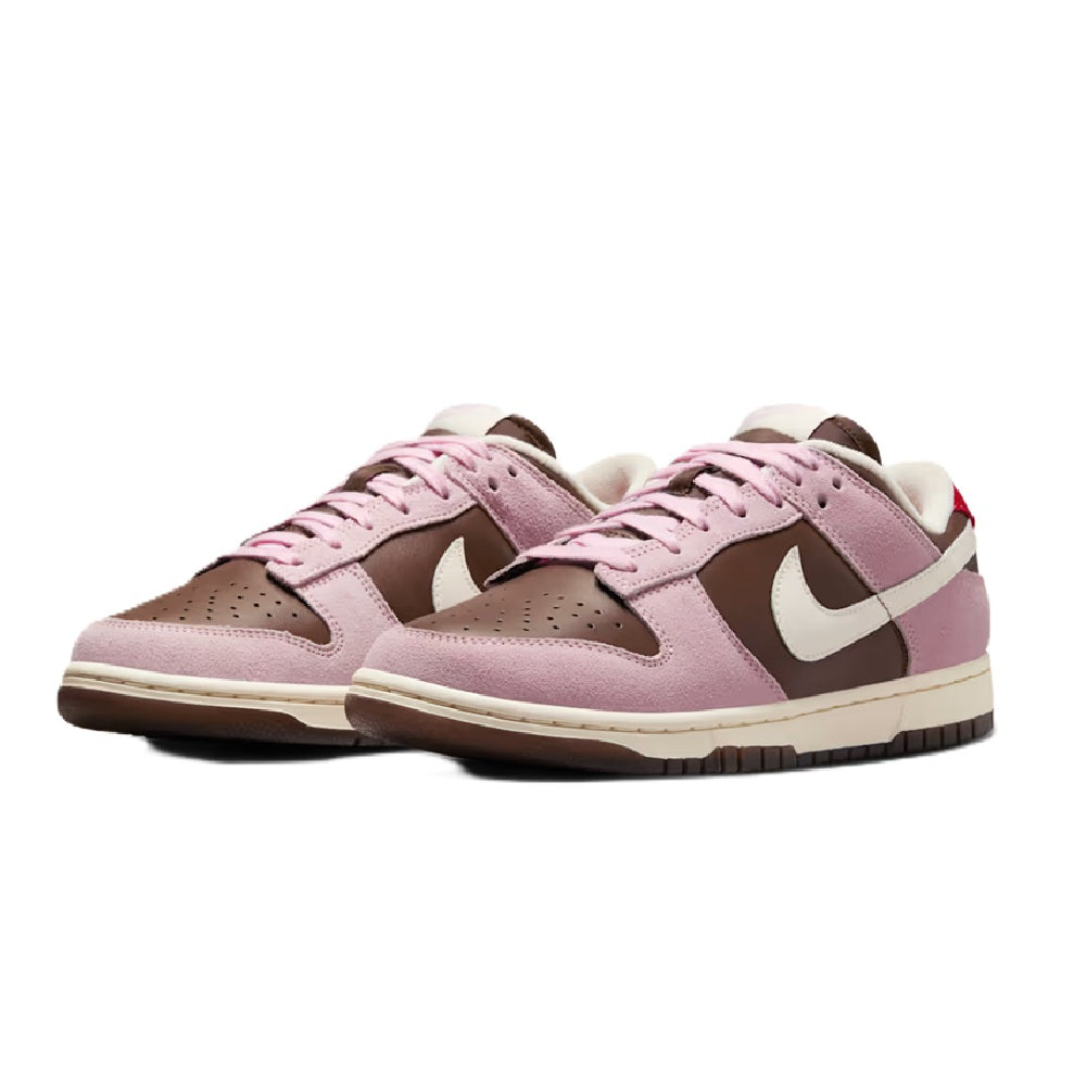 Nike Dunk Low pair, mauve-pink leather with white swooshes and brown toe panels