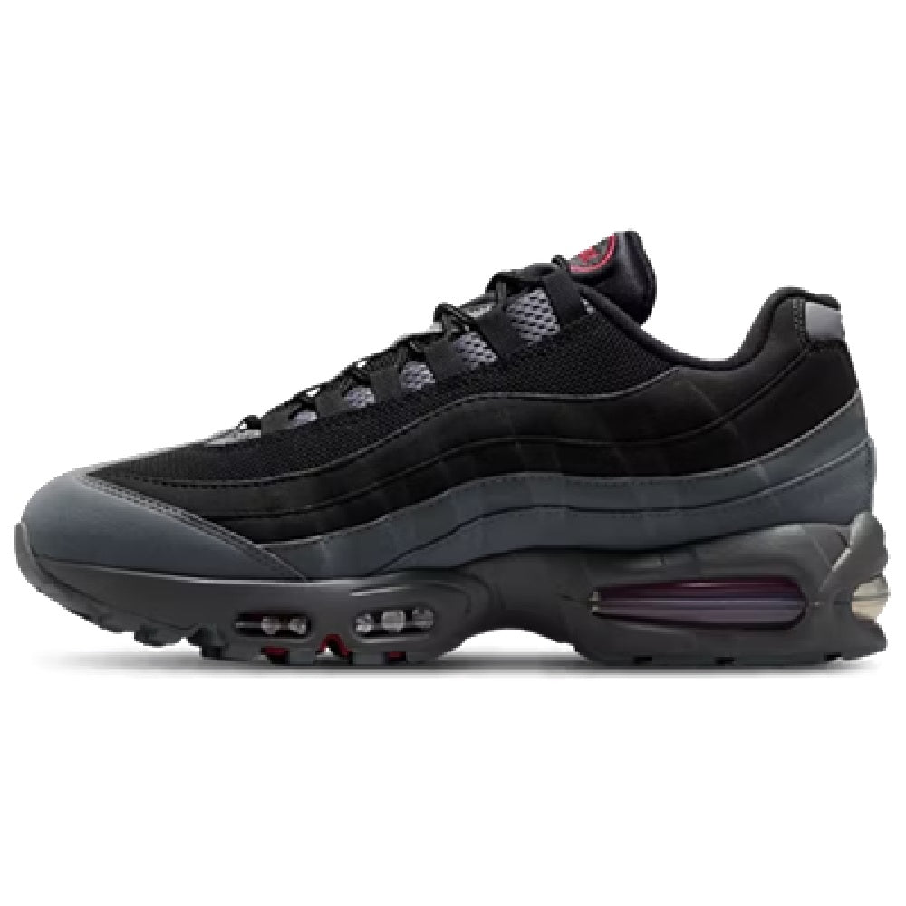 Men's black running sneakers with laced mesh upper and Max Air cushioning window